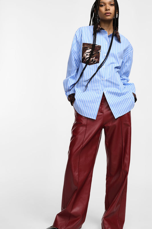 Červené široké kalhoty z eko kůže