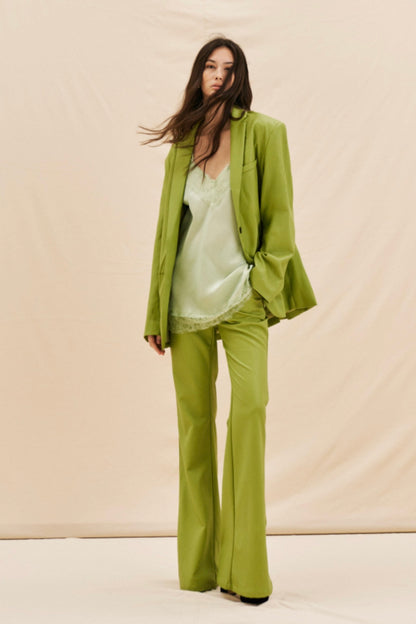 Zelené flared kalhoty z eko kůže